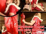 Xozt – Christmas games two girls dressed in latex (part 2)