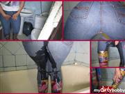 Gabby30 – pissing in jeans in the bathroom