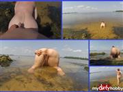 Snejka – pissing in the dog pose on the beach (3)